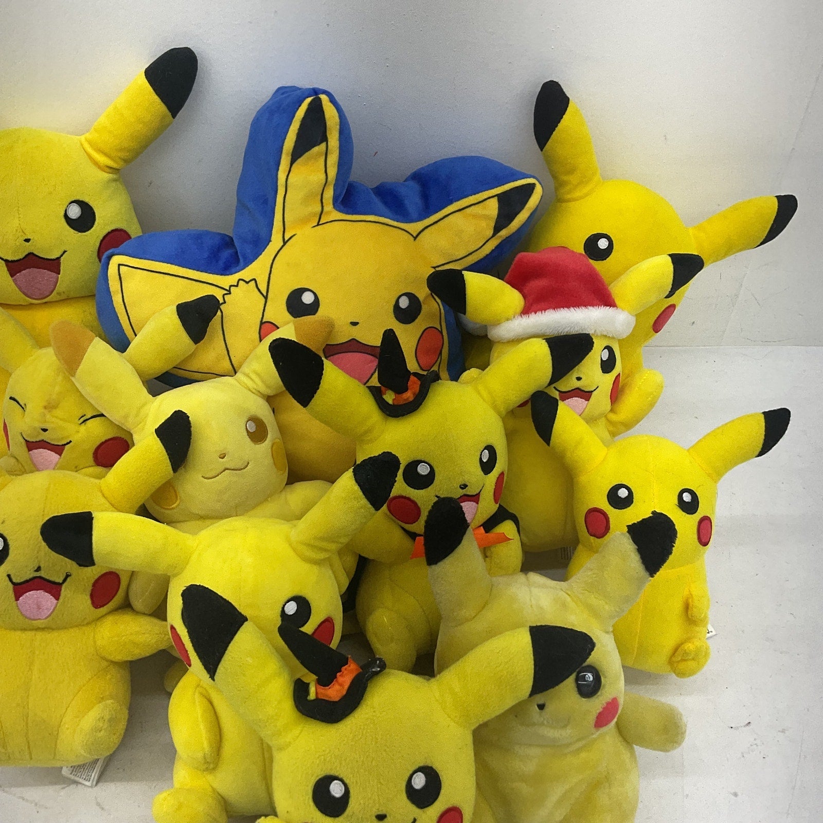 Preowned Yellow Pokémon Plush Toys Pikachu Assorted Designs 5 lbs LOT - Warehouse Toys