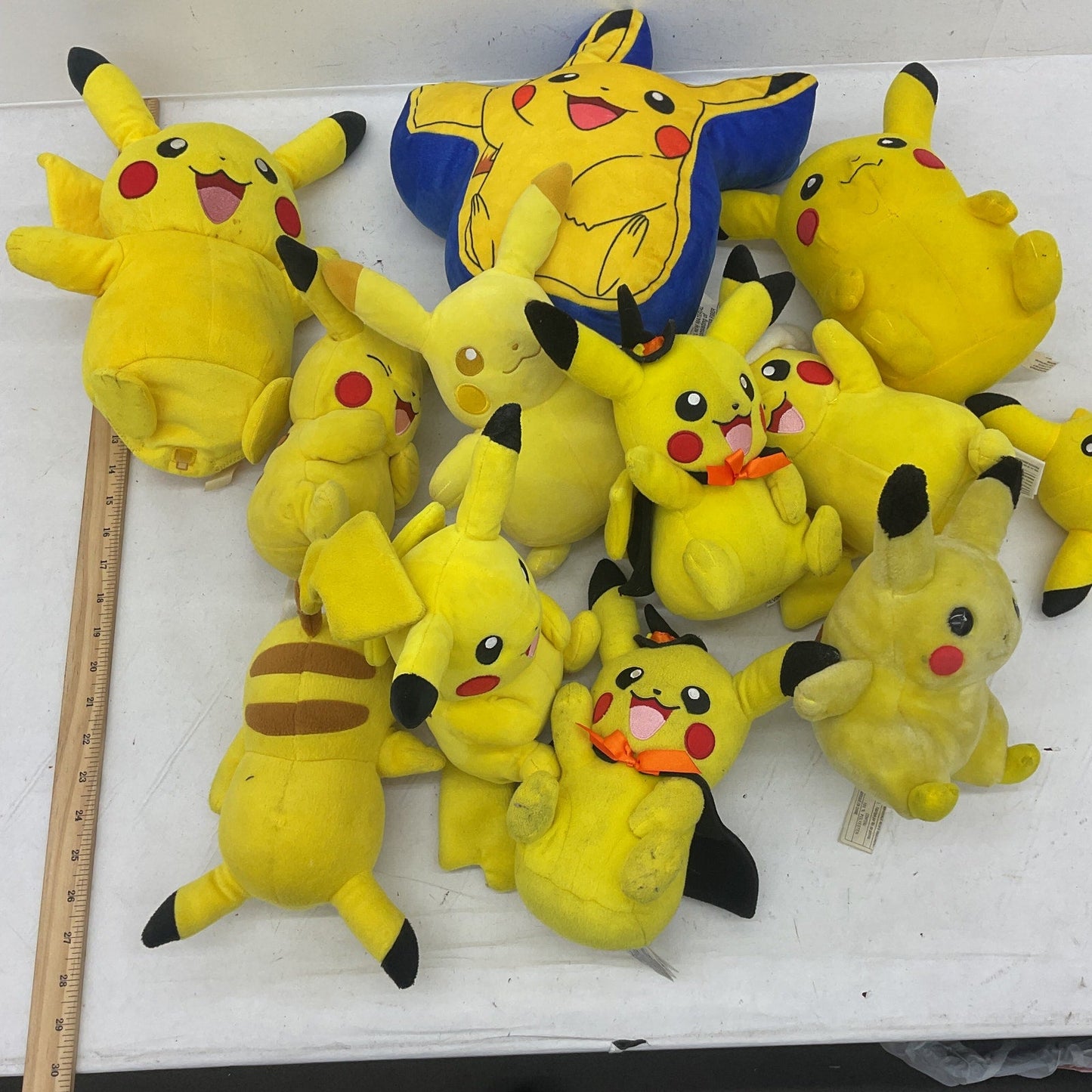 Preowned Yellow Pokémon Plush Toys Pikachu Assorted Designs 5 lbs LOT - Warehouse Toys