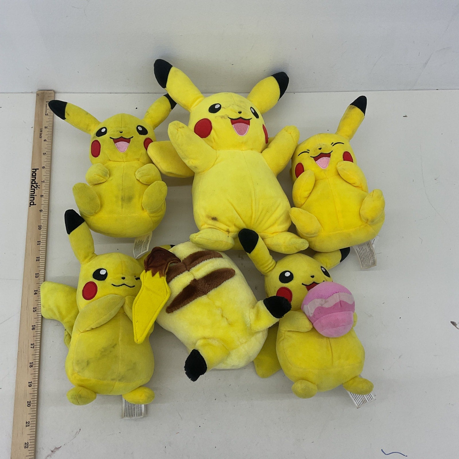 Preowned Yellow Pokemon Stuffed Animal Toys LOT Pikachu Different Expressions - Warehouse Toys