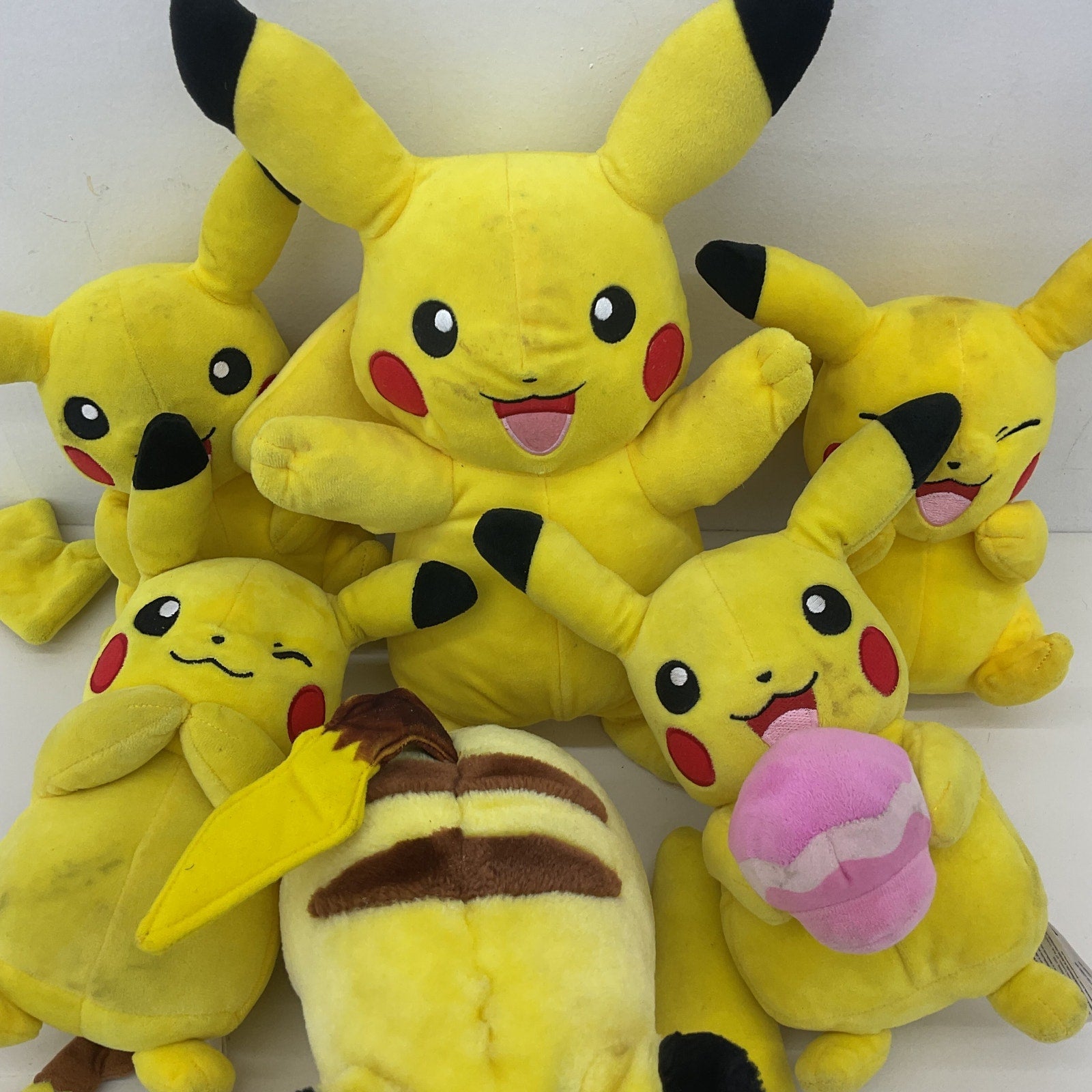 Preowned Yellow Pokemon Stuffed Animal Toys LOT Pikachu Different Expressions - Warehouse Toys