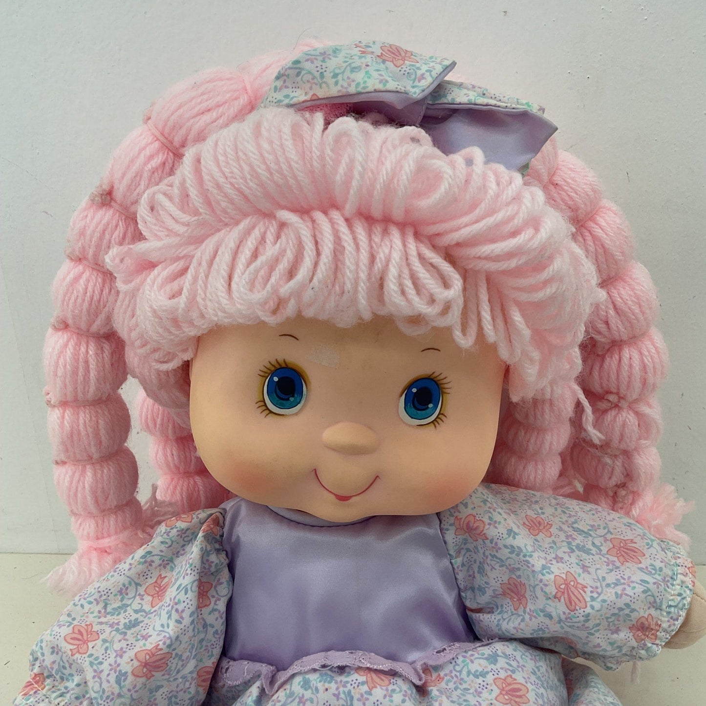 TCFC 1986 Pink & Purple Preowned Vintage Baby Doll Tuggabows Yarn Hair Girl - Warehouse Toys